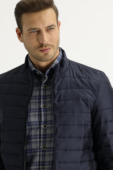 Orta Lacivert Slim Fit Dar Kesim Kapitone Spor Mont