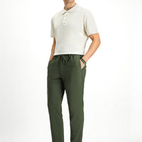 Koyu Yeşil Super Slim Fit Ekstra Dar Kesim Beli Lastikli İpli Gofre Likralı Klasik Kumaş Pantolon