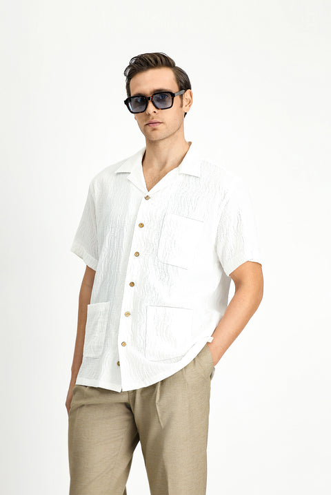 Off-white short-sleeved oversized cotton patterned shirt