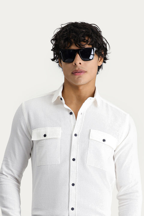 Off-white long-sleeved slim-fit cotton sports shirt.