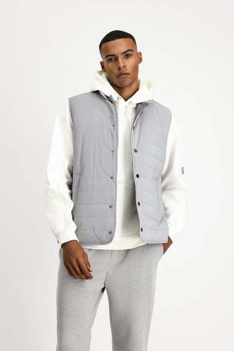 Orta Gri Slim Fit Dar Kesim Dik Yaka Çıtçıtlı Cepli Spor Kapitone Yelek