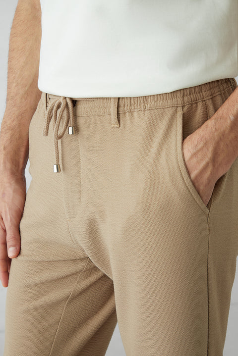 Koyu Bej Regular Fit Standart Kesim Beli Lastikli İpli Çizgili Yan Cepli Jogger Pantolon
