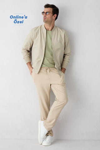  Açık Bej Regular Fit Standart Kesim Yandan Cep Beli Lastikli İpli Jogger Pantolon